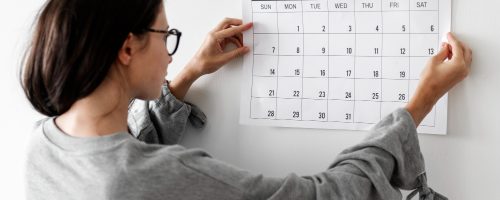 woman-checking-the-calendar